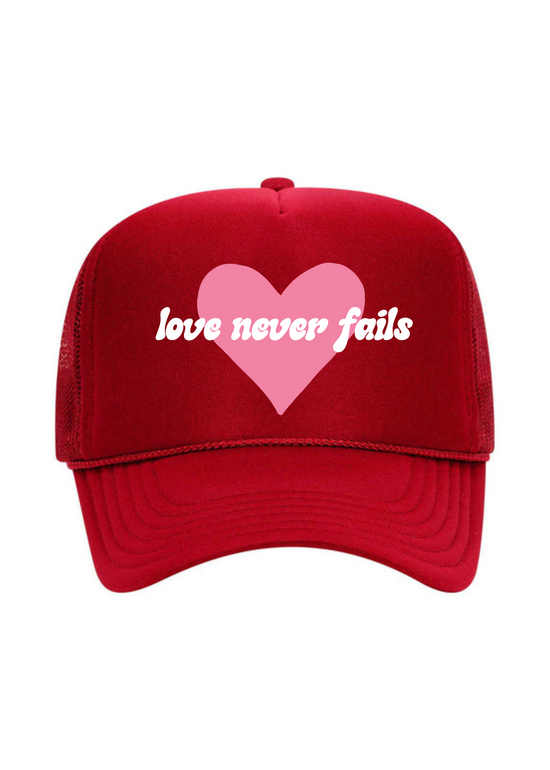 Love Never Fails | Youth + Adult Trucker Hat-Hats-Sister Shirts-Sister Shirts, Cute & Custom Tees for Mama & Littles in Trussville, Alabama.