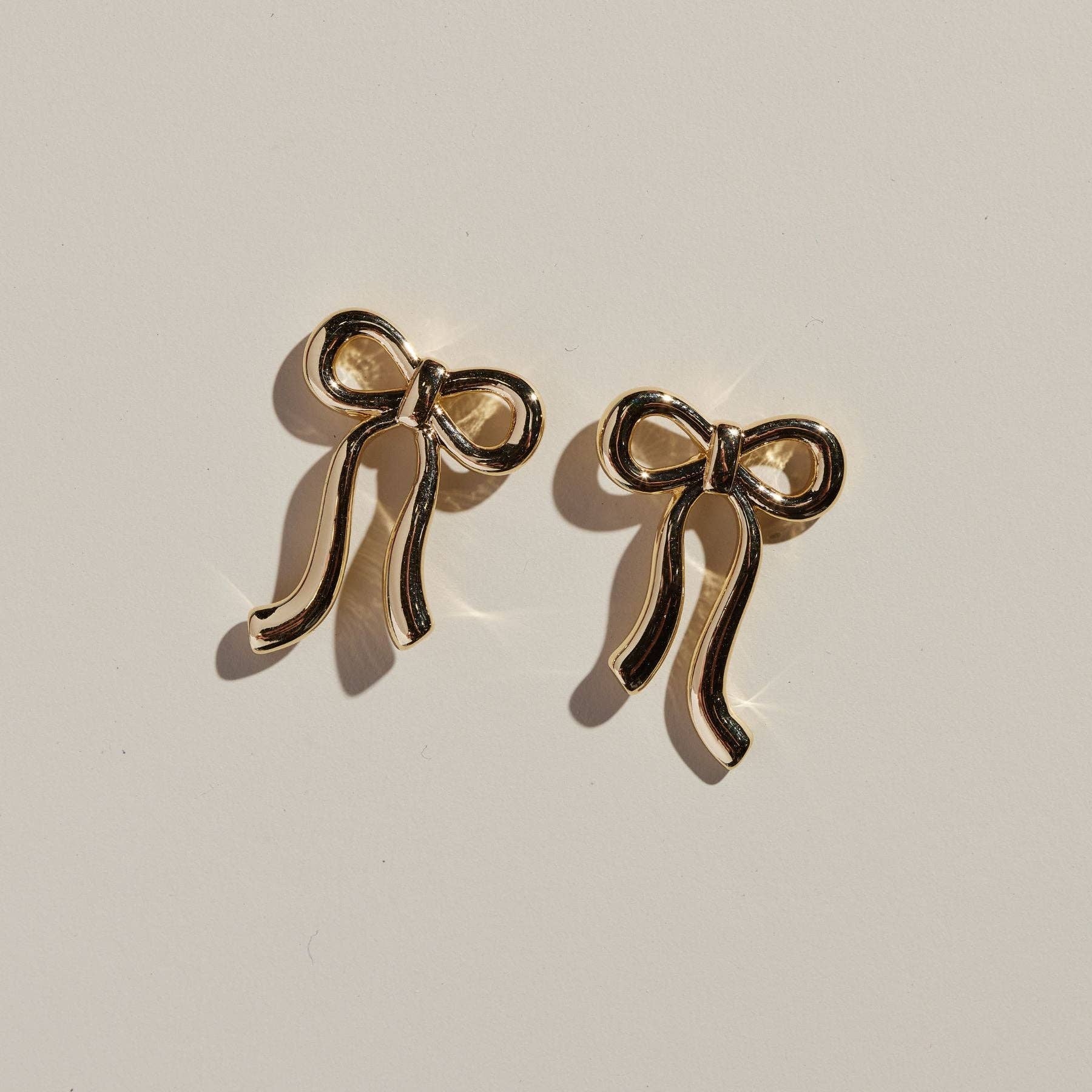 Gold Ribbon Bow Stud Earrings-Women - Jewelry - Earrings-Nickel and Suede-Sister Shirts, Cute & Custom Tees for Mama & Littles in Trussville, Alabama.