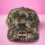 he’s hunting. | Adult Trucker Hat-Women - Accessories - Hats-Sister Shirts-Sister Shirts, Cute & Custom Tees for Mama & Littles in Trussville, Alabama.