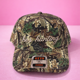 he’s hunting. | Adult Trucker Hat-Women - Accessories - Hats-Sister Shirts-Sister Shirts, Cute & Custom Tees for Mama & Littles in Trussville, Alabama.